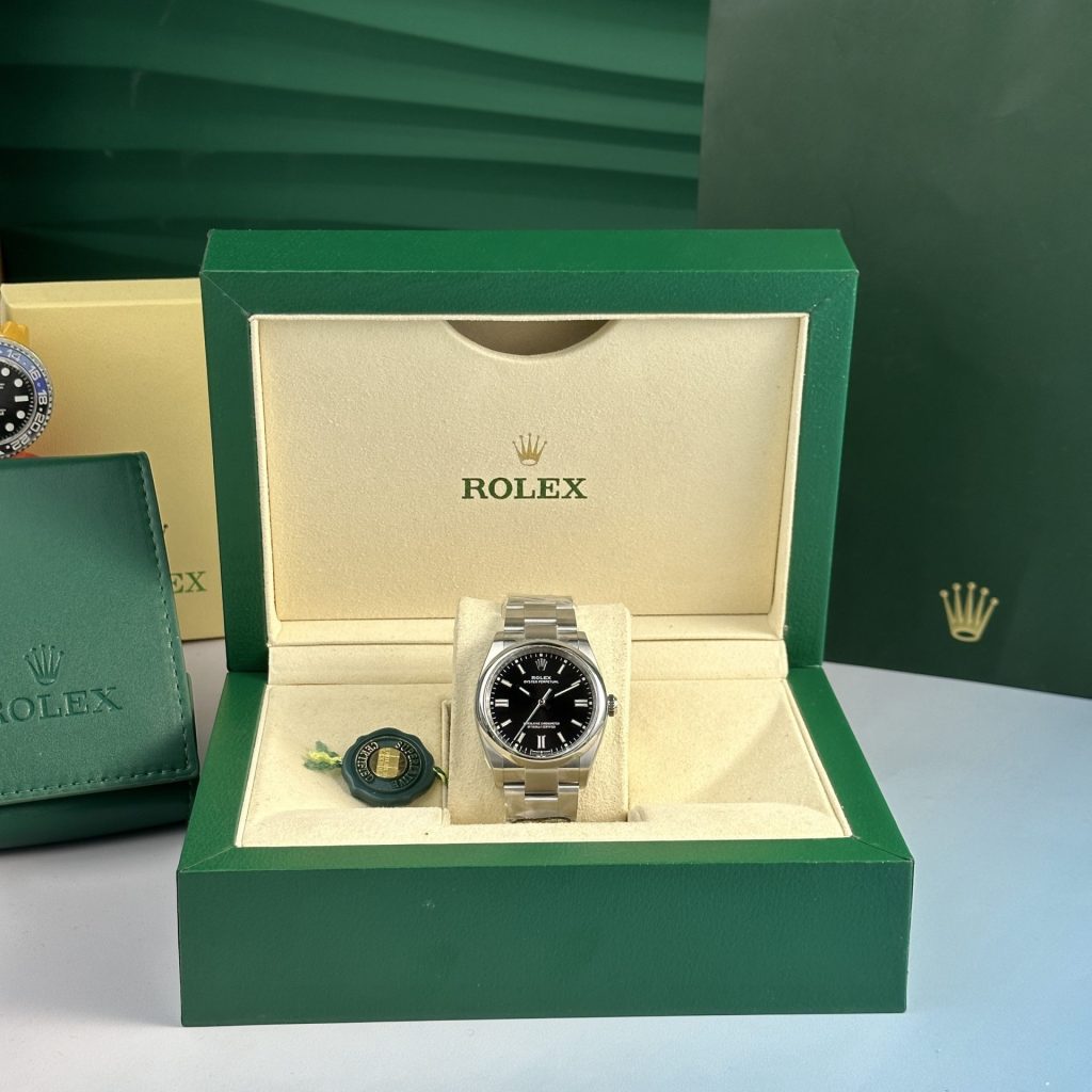 Rolex Oyster Perpetual 126000 Black Dial 36mm 1