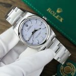 Rolex Oyster Perpetual 126000 purple Dial 36mm 2